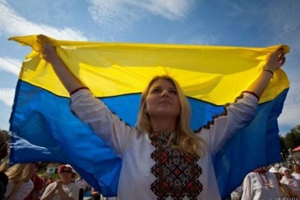 Після повернення Донбасу в Україну 52 відсотки жителів ОРДЛО зібралися вивісити український прапор, а 3 відсотки – піти в партизани